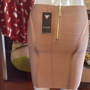 Guess Los Angeles new with tags size small tan skirt, gold zip up back